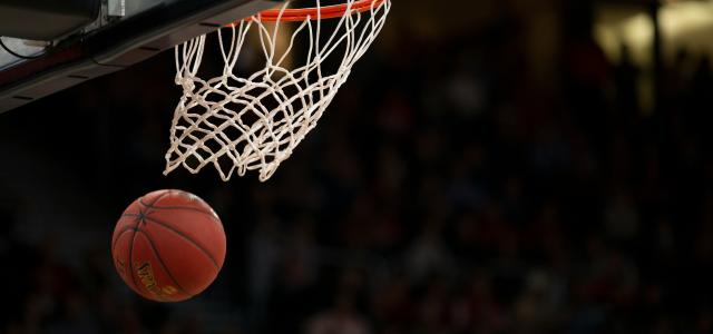 ball under basketball ring by Markus Spiske courtesy of Unsplash.